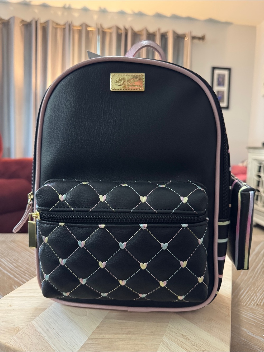 Betsey Johnson Black Mini Backpack with Pink Trim and Quilted Heart Front